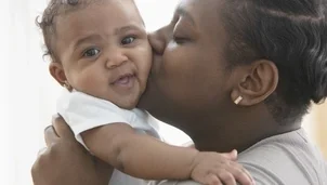 Parent holding their baby