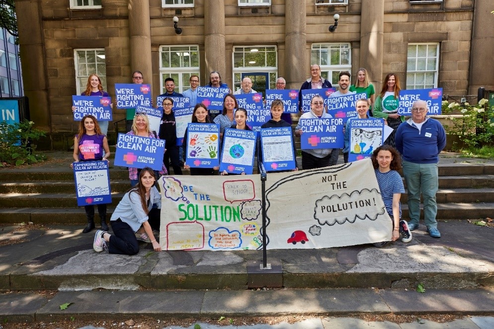 /Clean%20air%20campaigners%20standing%20together%20with%20posters