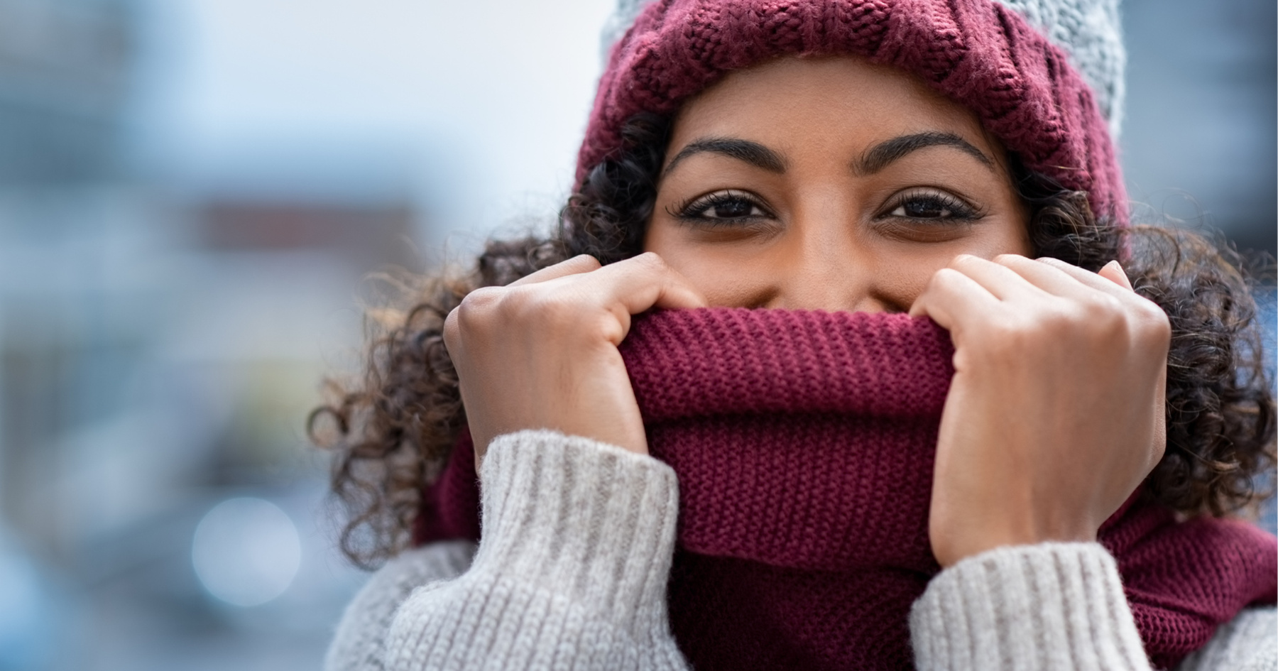 Woman wearing a hat and scarf