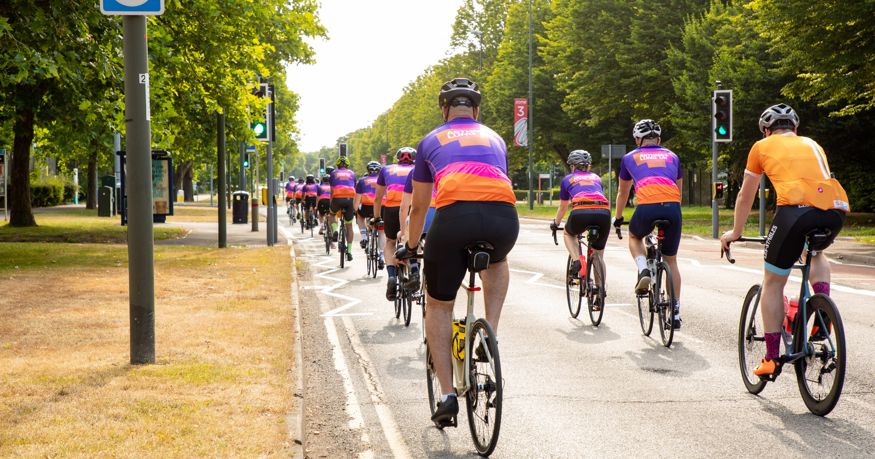 Peloton cycling from behind