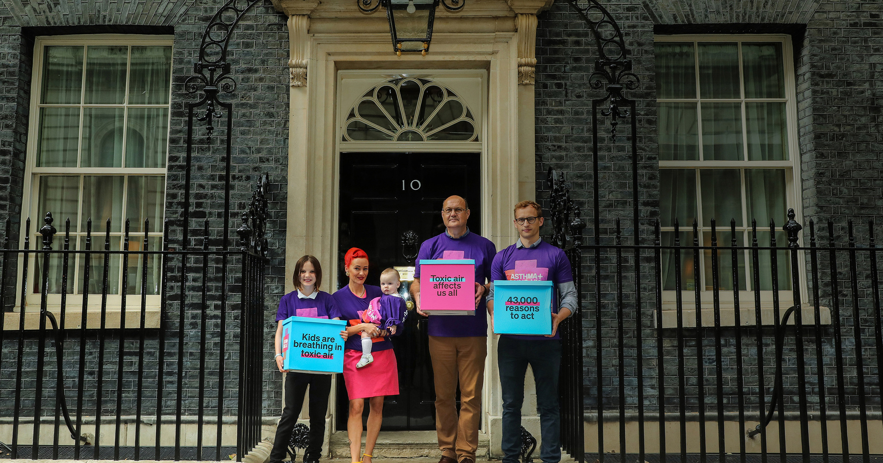 Group of asthma and lung uk campaigners gathered outside downing street