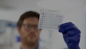 Lab researcher examining samples